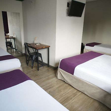 Hotel City Posadas Bagian luar foto
