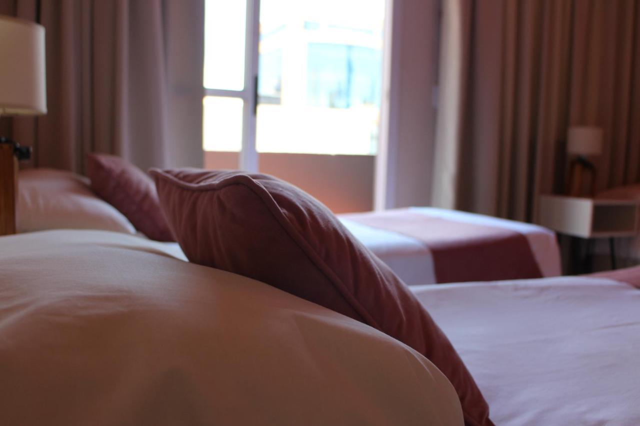 Hotel City Posadas Bagian luar foto
