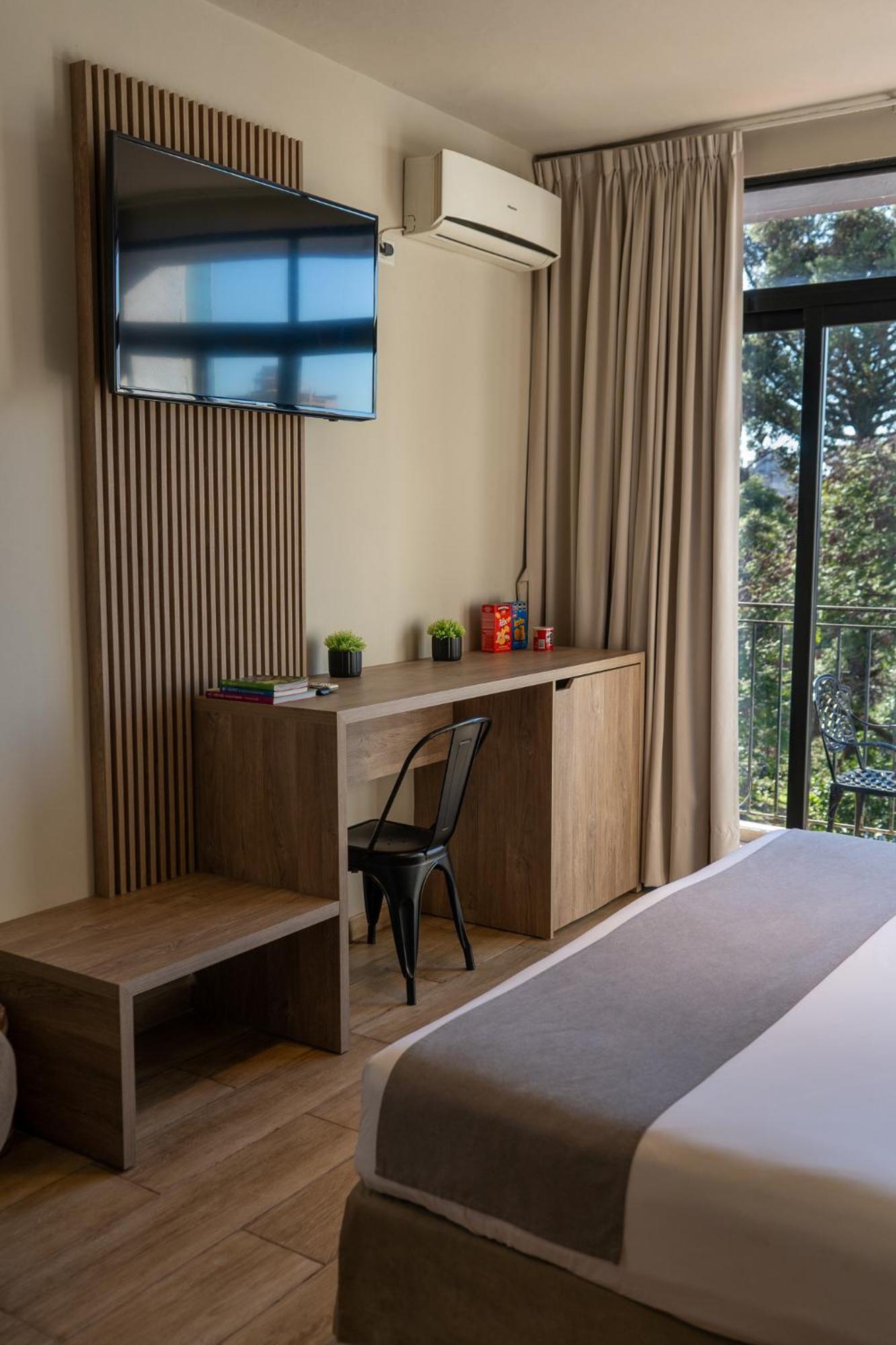 Hotel City Posadas Bagian luar foto
