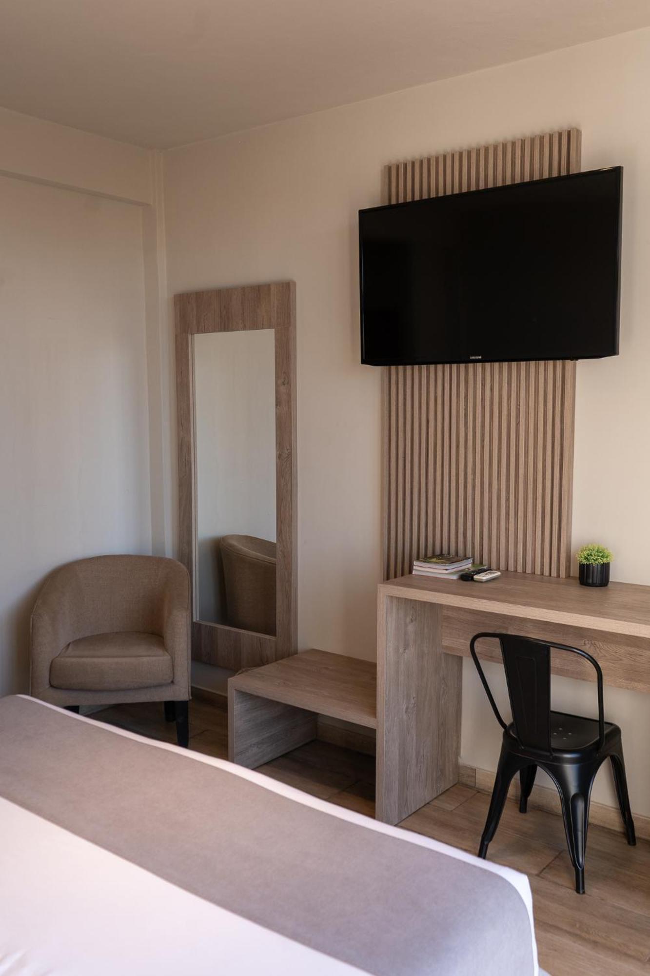 Hotel City Posadas Bagian luar foto